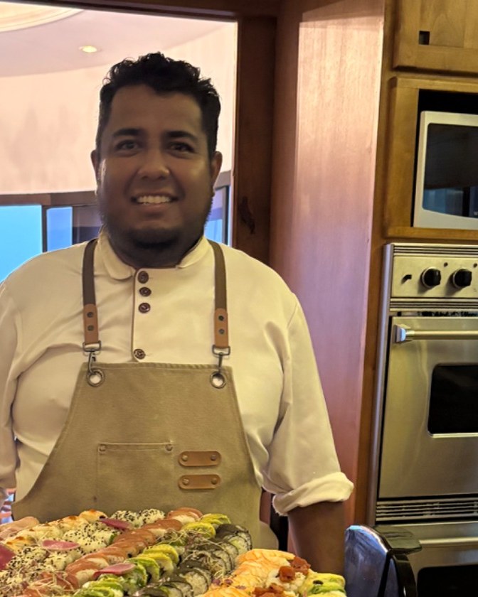 Israel Rojas plating the first course